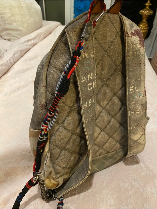 CHANEL Faded Beige Canvas Backpack with Multicolor Strap and Silver-Tone Charm main image 4